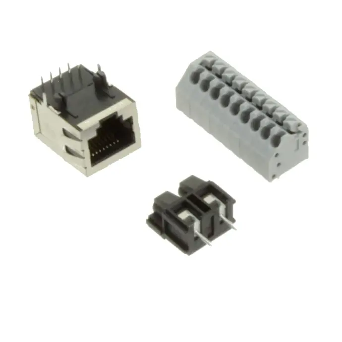 Three connectors are shown, one RJ45 ethernet connector with its PCB pis upwards, one grey cable to board connector with possibility to connect 10 wires and one black wire to board connector for bigger diameter wires.