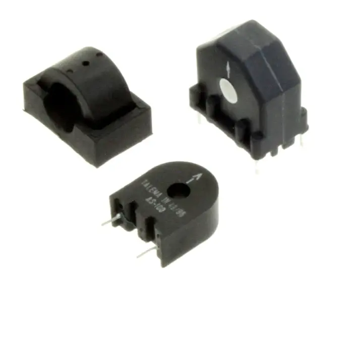 Three current sensors, all black, one with a removable top in order to easily remove the conductor that will be routed through the hole, the other two are similar black boxes with a hole in the center through which a cable or inductor is routed to measure the current.